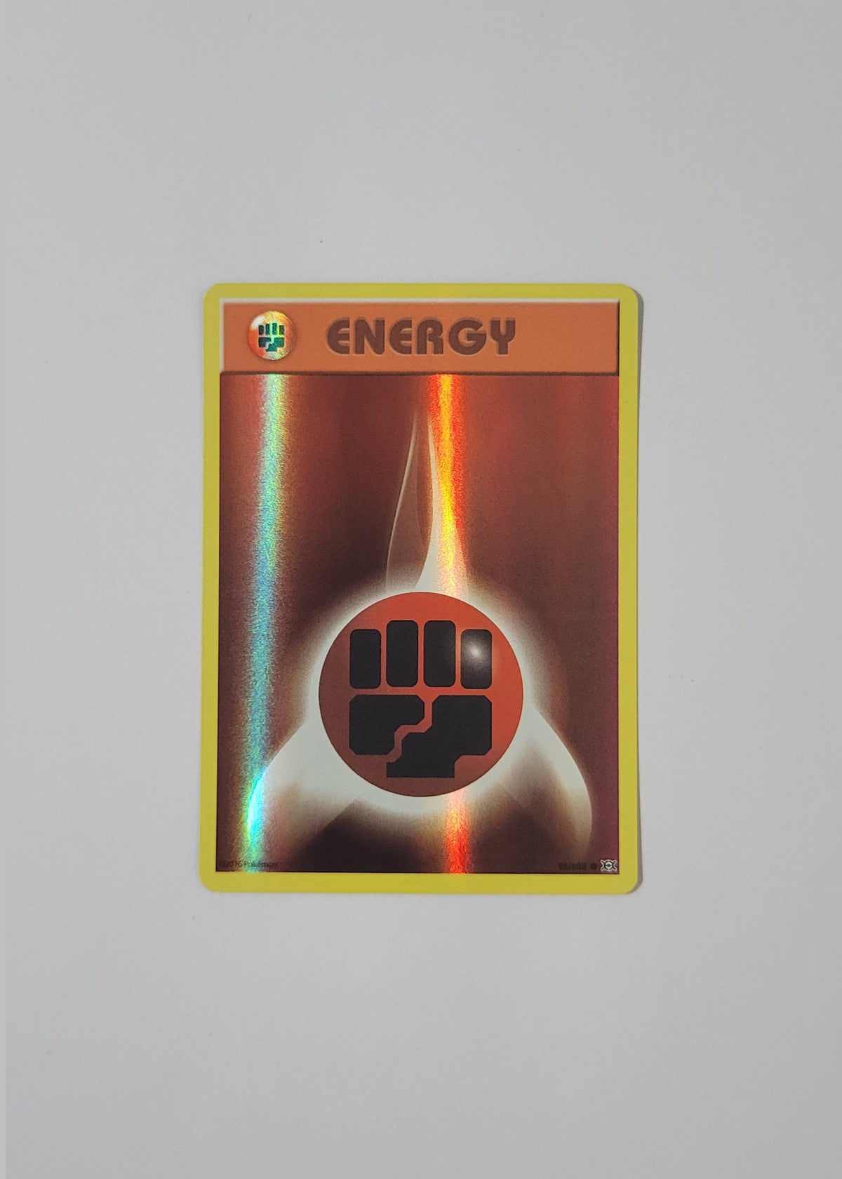 Fighting Energy 96/108 (Holo) - Evolutions
