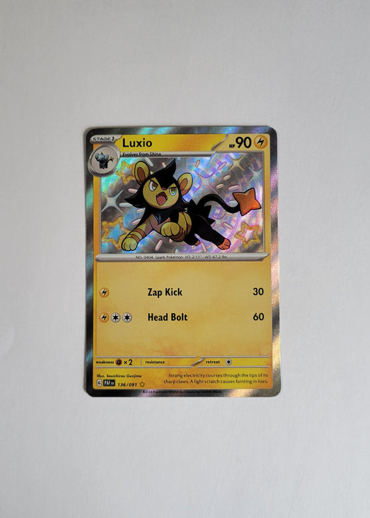 Luxio 136/091- Paldean Fates