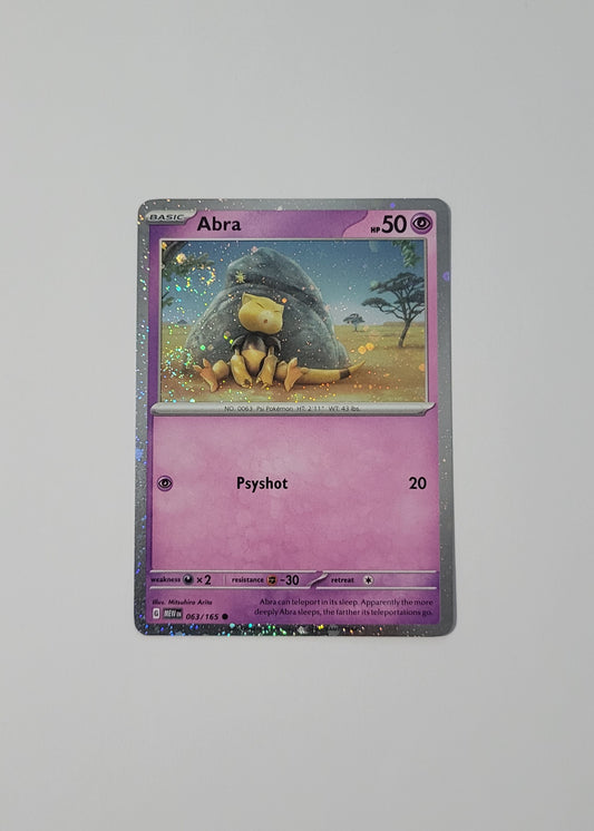 Abra 063/165 (Cosmos Holo) - 151